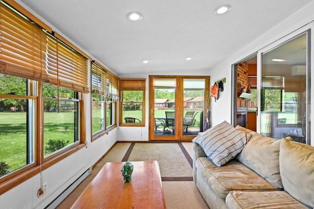 3865 Wahtomin Trl NW, Alexandria, MN 56308 - sunroom / solarium with a baseboard heating unit, recessed lighting, french doors, baseboards, and carpet flooring