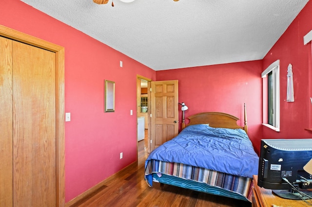 3865 Wahtomin Trl NW, Alexandria, MN 56308 - bedroom with wood finished floors and a textured ceiling