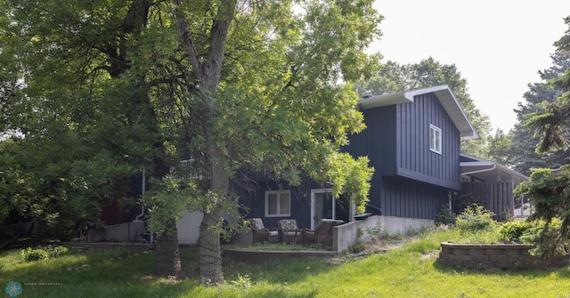 1427 23rd St S, Fargo, ND 58103 - back of house with an outdoor living space
