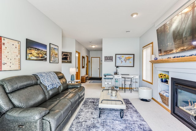 11001 Isanti Ct NE, Blaine, MN 55449 - living area with carpet floors, a large fireplace, and baseboards
