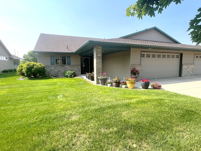 1209 23rd St SE, Willmar, MN 56201 - view of front of home with a garage, driveway, a front lawn, and roof with shingles