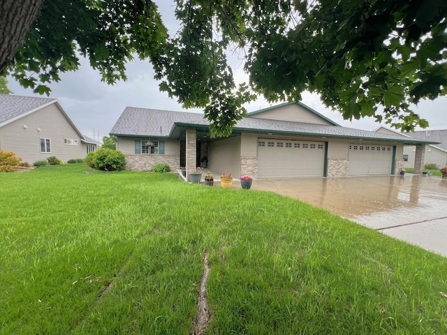 1209 23rd St SE, Willmar, MN 56201 - ranch-style house with stone siding, an attached garage, a front lawn, and driveway
