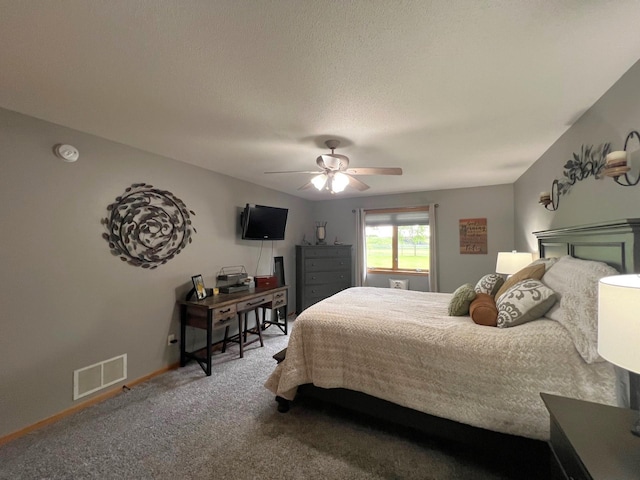 1209 23rd St SE, Willmar, MN 56201 - bedroom with carpet flooring, a ceiling fan, and baseboards