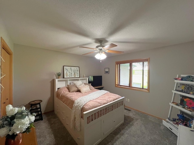 1209 23rd St SE, Willmar, MN 56201 - bedroom with carpet, a textured ceiling, and a ceiling fan