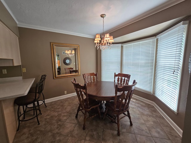 620 5th Ave SE, Pipestone, MN 56164 - dining area featuring a chandelier, ornamental molding, tile patterned floors, and baseboards