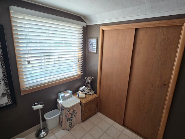 620 5th Ave SE, Pipestone, MN 56164 - bedroom featuring a closet and light tile patterned floors