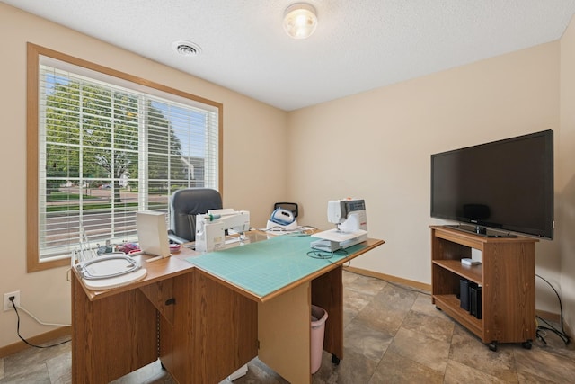 15548 Float Ln Unit 104, Apple Valley, MN 55124 - home office featuring baseboards, stone finish floors, and a textured ceiling