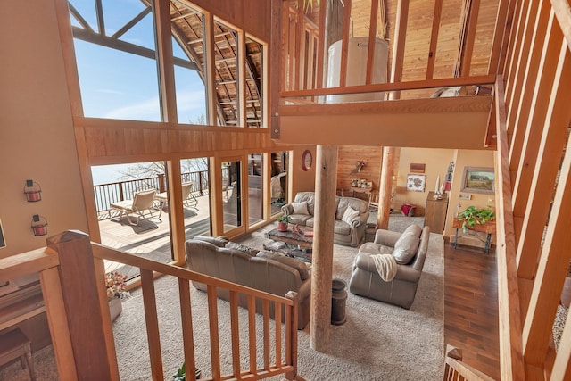 2917 Vonderheide Dr SW, Alexandria, MN 56308 - living area featuring a towering ceiling, wood finished floors, and healthy amount of natural light
