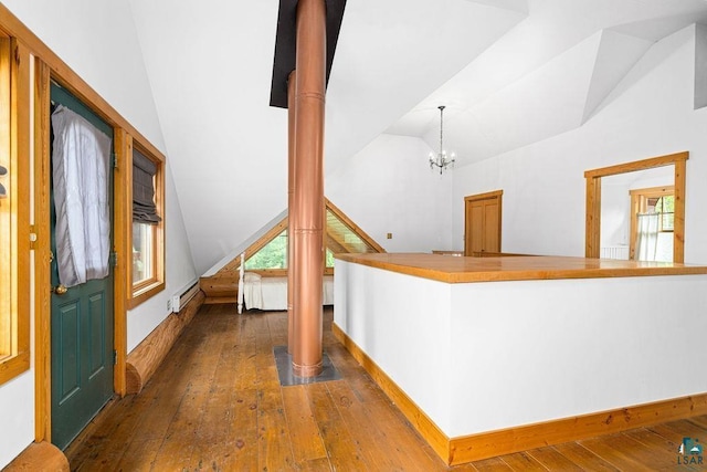 4015 Van Rd, Duluth, MN 55803 - corridor featuring vaulted ceiling, plenty of natural light, hardwood / wood-style floors, a chandelier, and baseboards