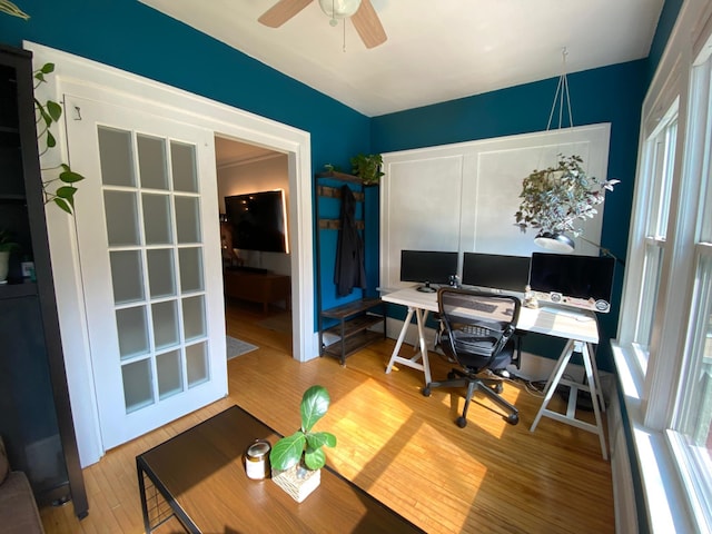 3112 Bryant Ave S Unit 1, Minneapolis, MN 55408 - home office featuring wood finished floors and a ceiling fan