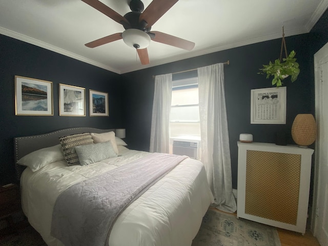 3112 Bryant Ave S Unit 1, Minneapolis, MN 55408 - bedroom featuring ornamental molding, cooling unit, wood finished floors, and a ceiling fan