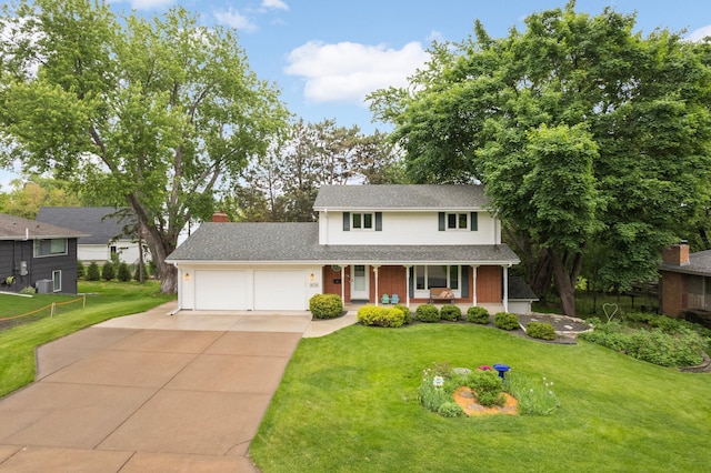 1624 Saint Croix Cir, Golden Valley, MN 55422 - traditional-style home with a garage, covered porch, driveway, and a front yard