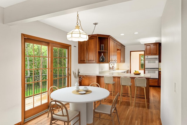 1624 Saint Croix Cir, Golden Valley, MN 55422 - dining space featuring light wood-style floors and recessed lighting