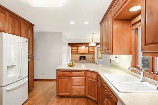 1624 Saint Croix Cir, Golden Valley, MN 55422 - kitchen featuring white refrigerator with ice dispenser, a sink, light wood-style flooring, baseboards, and recessed lighting