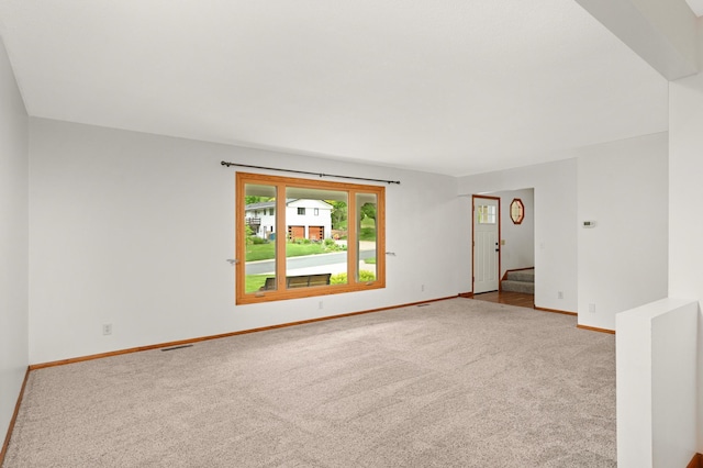 1624 Saint Croix Cir, Golden Valley, MN 55422 - spare room with carpet floors, baseboards, and stairs