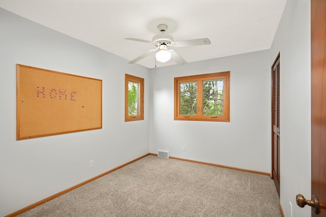 1624 Saint Croix Cir, Golden Valley, MN 55422 - empty room with carpet floors, a ceiling fan, and baseboards