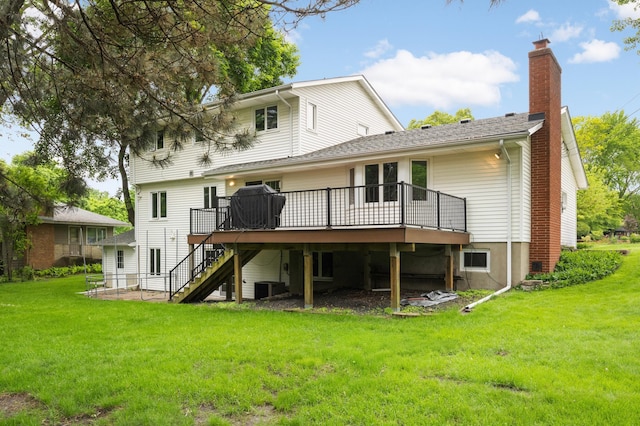 1624 Saint Croix Cir, Golden Valley, MN 55422 - back of house featuring stairs, a deck, a chimney, and a lawn