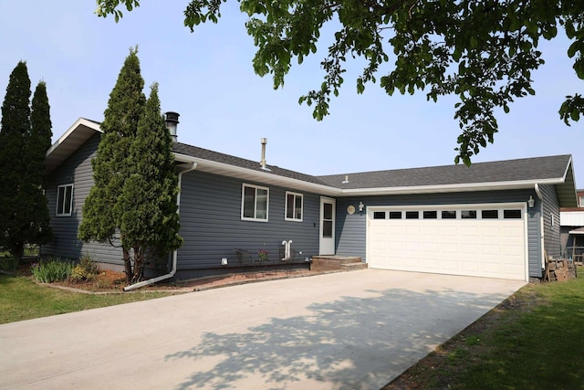 531 5th Street Ct E, West Fargo, ND 58078 - ranch-style home featuring a garage and concrete driveway