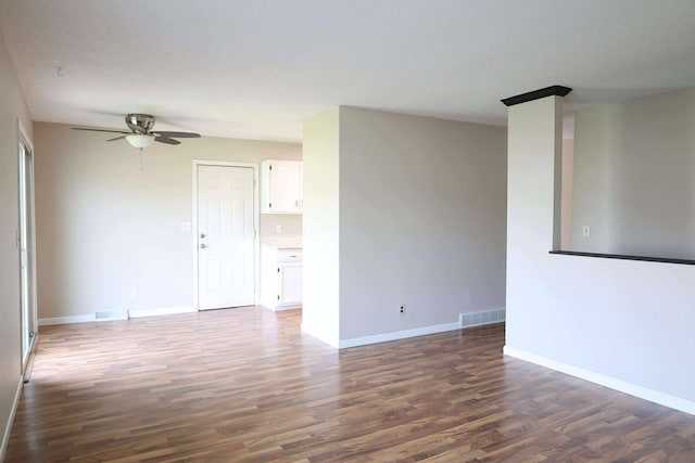 531 5th Street Ct E, West Fargo, ND 58078 - spare room featuring ceiling fan, dark wood finished floors, and baseboards