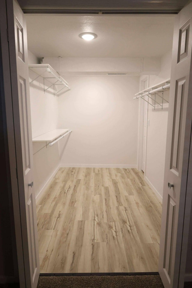 531 5th Street Ct E, West Fargo, ND 58078 - spacious closet with light wood-type flooring
