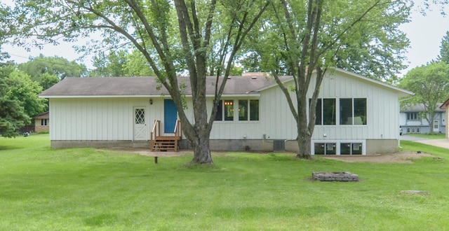 2603 140th Ln NW, Andover, MN 55304 - back of property featuring entry steps, a yard, and board and batten siding
