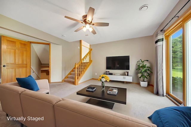 7811 209th St N, Forest Lake, MN 55025 - carpeted living room featuring stairs and a ceiling fan