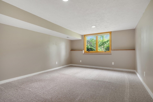7811 209th St N, Forest Lake, MN 55025 - empty room with carpet, a textured ceiling, and recessed lighting