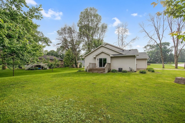 7811 209th St N, Forest Lake, MN 55025 - rear view of property featuring a yard