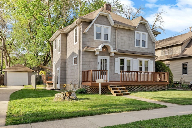 308 4th Ave SW, Austin, MN 55912 - view of front of home with a wooden deck, roof with shingles, driveway, a chimney, and a garage