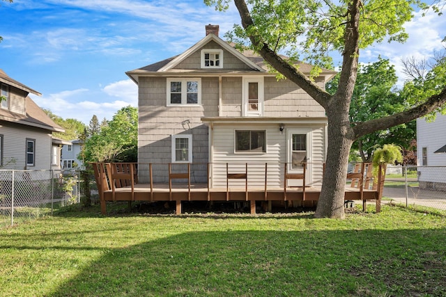 308 4th Ave SW, Austin, MN 55912 - back of house featuring a chimney and a deck