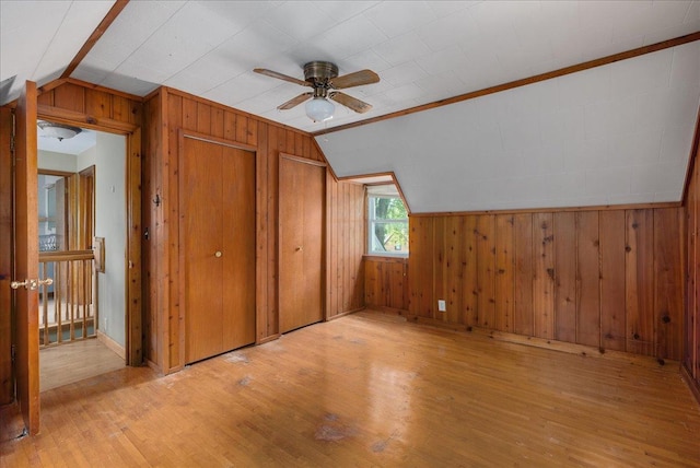 950 Clark St, Hammond, WI 54015 - bonus room featuring lofted ceiling, light wood-style floors, a ceiling fan, and wood walls