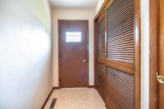 727 Peck St, Fergus Falls, MN 56537 - doorway to outside with baseboards and light floors