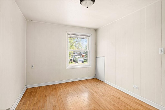 1040 86th Ave W, Duluth, MN 55808 - spare room with light wood-style floors and baseboards