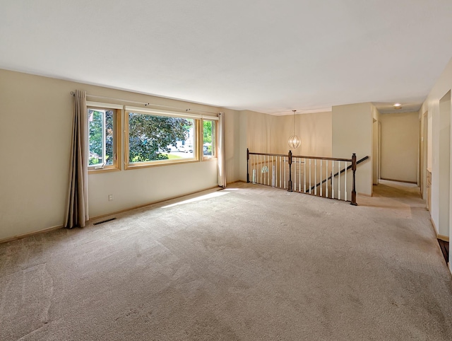 15142 75th Ave N, Maple Grove, MN 55311 - carpeted empty room with a chandelier