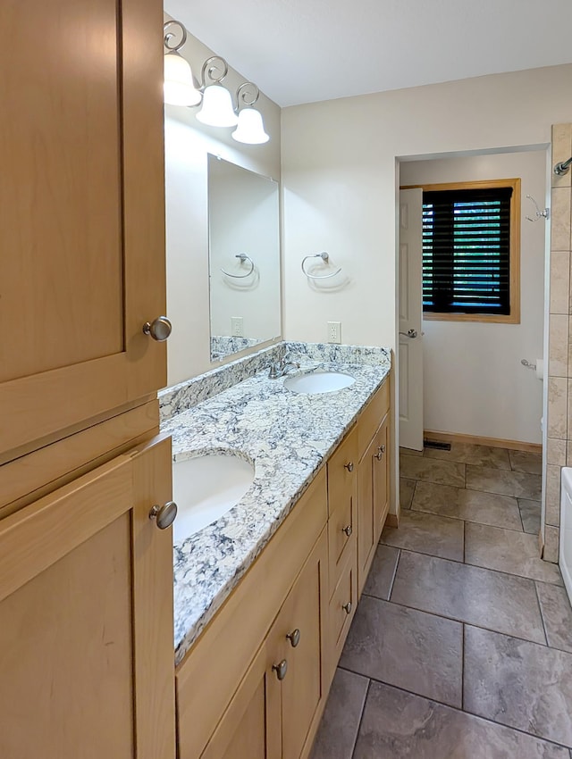 15142 75th Ave N, Maple Grove, MN 55311 - bathroom with double vanity, shower / tub combination, and baseboards