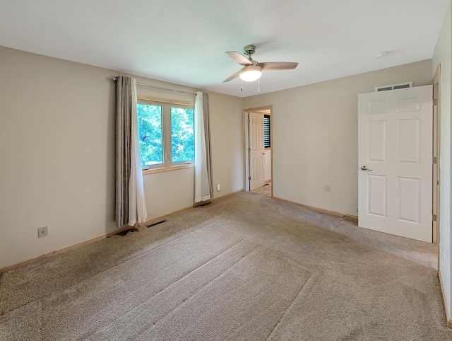 15142 75th Ave N, Maple Grove, MN 55311 - unfurnished room featuring a ceiling fan, light colored carpet, baseboards, and a smoke detector