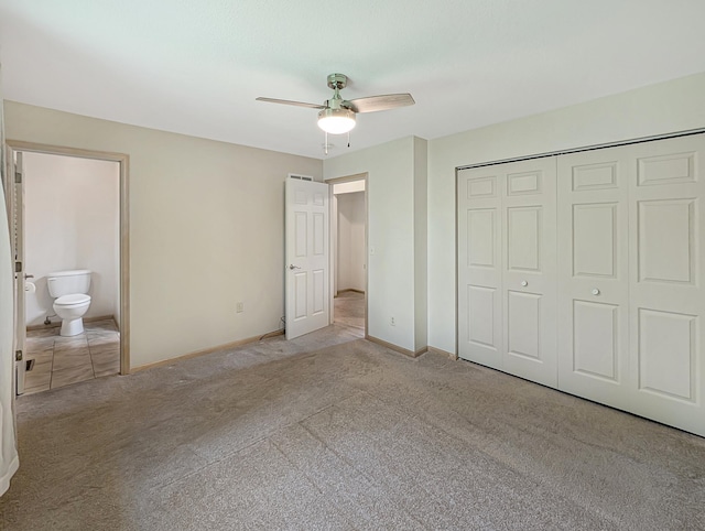 15142 75th Ave N, Maple Grove, MN 55311 - unfurnished bedroom featuring carpet floors, a closet, baseboards, and ceiling fan