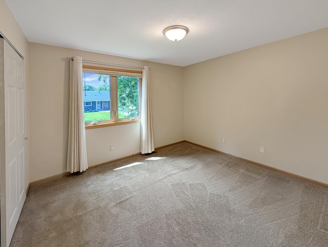 15142 75th Ave N, Maple Grove, MN 55311 - empty room with carpet flooring and baseboards