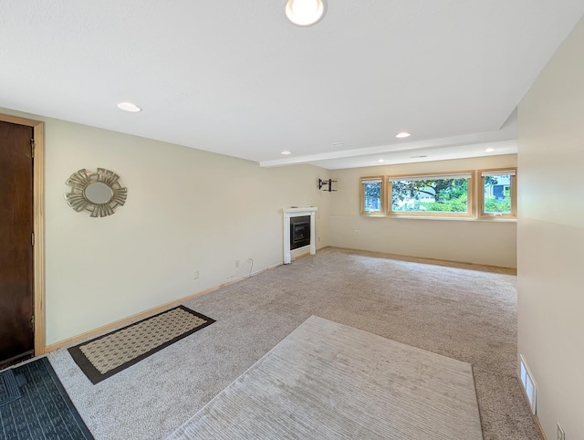 15142 75th Ave N, Maple Grove, MN 55311 - unfurnished living room featuring carpet floors, recessed lighting, a fireplace, and baseboards