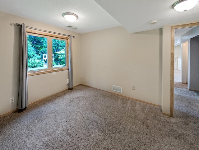 15142 75th Ave N, Maple Grove, MN 55311 - unfurnished room with carpet floors, a smoke detector, baseboards, and a textured ceiling