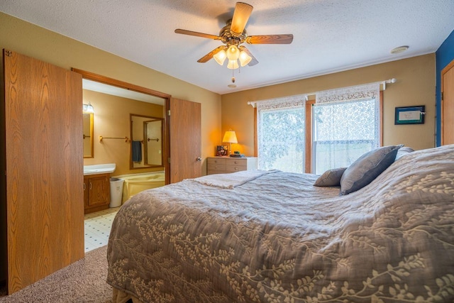 S363 Nicholes Rd, Naples Twp, WI 54755 - bedroom with connected bathroom and a textured ceiling
