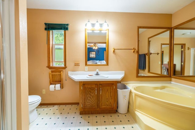 S363 Nicholes Rd, Naples Twp, WI 54755 - full bathroom with vanity, toilet, and tile patterned floors