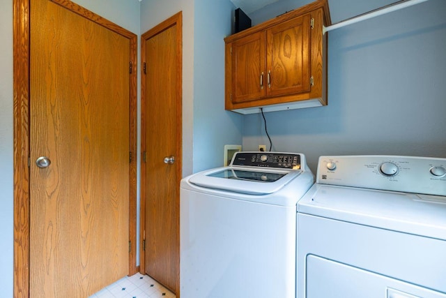 S363 Nicholes Rd, Naples Twp, WI 54755 - washroom featuring cabinet space and independent washer and dryer