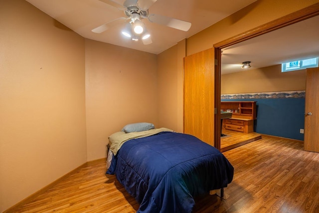 S363 Nicholes Rd, Naples Twp, WI 54755 - bedroom with wood finished floors and ceiling fan