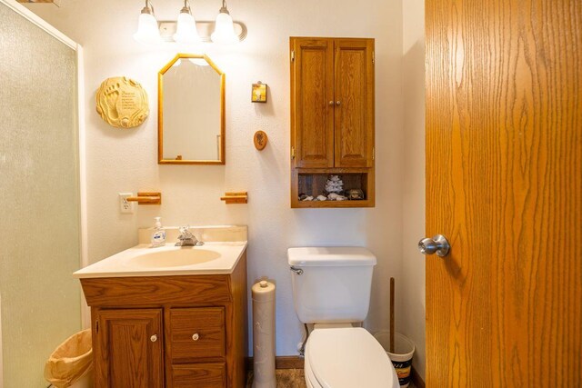 S363 Nicholes Rd, Naples Twp, WI 54755 - bathroom with toilet and vanity