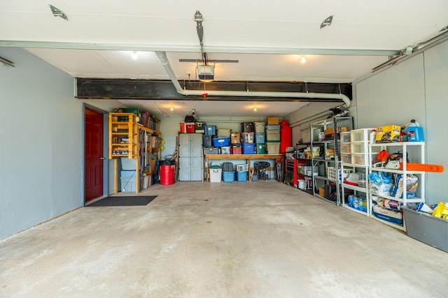 S363 Nicholes Rd, Naples Twp, WI 54755 - garage featuring a garage door opener