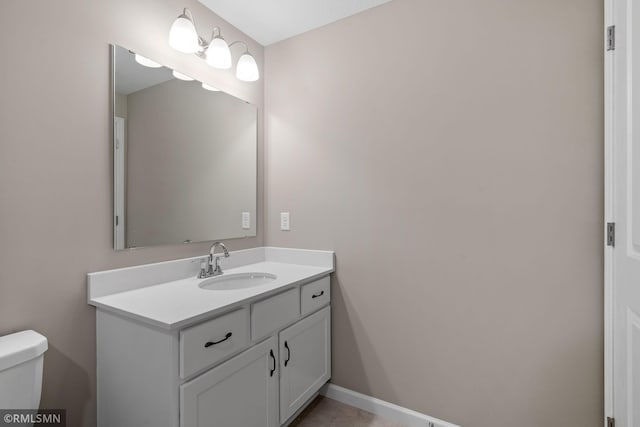 1009 2nd St NW, Delano, MN 55328 - half bath with toilet, vanity, and baseboards