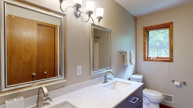 5121 Cameron Dr NW, Cascade Twp, MN 55901 - full bathroom featuring double vanity and toilet