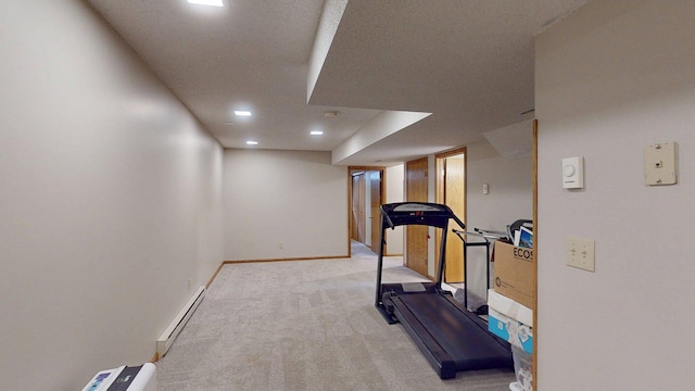 5121 Cameron Dr NW, Cascade Twp, MN 55901 - workout area with baseboard heating, light colored carpet, baseboards, and recessed lighting