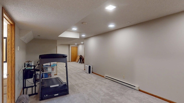 5121 Cameron Dr NW, Cascade Twp, MN 55901 - exercise area featuring baseboard heating, light carpet, recessed lighting, baseboards, and a textured ceiling